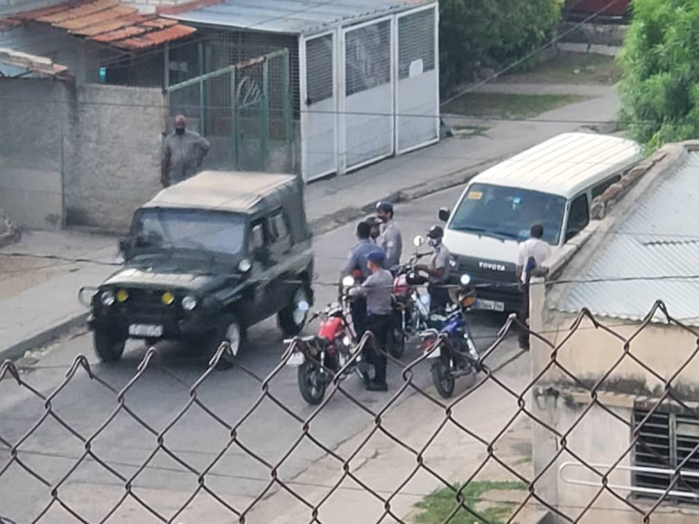 Police surveillance outside the home of a Cuban activist