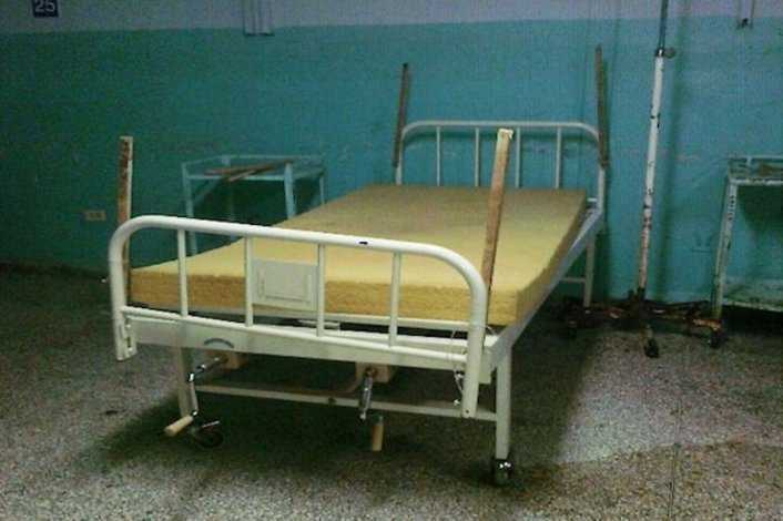 a broken hospital bed in Cuba